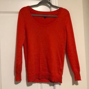 red/orange sweater